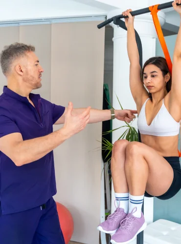 Physiotherapist providing athletic performance physiotherapy treatment at home in Karachi