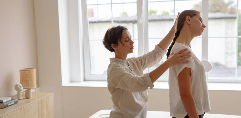 Physiotherapist providing chronic cervical radiculopathy physiotherapy treatment at home in Karachi