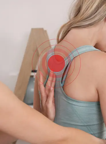 Physiotherapist providing chronic neck pain treatment at home in Karachi