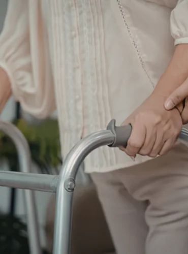 Physiotherapist providing delayed walking physiotherapy treatment at home in Karachi