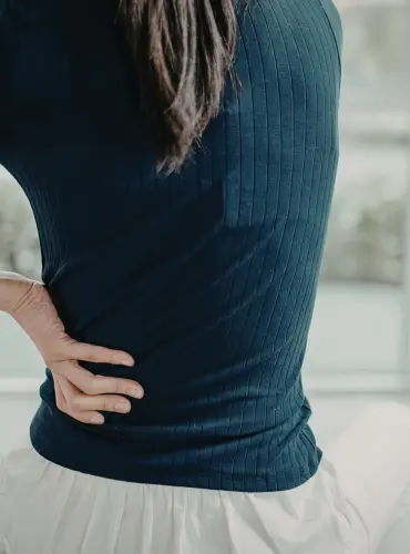 Physiotherapist providing discectomy physiotherapy treatment at home in Karachi