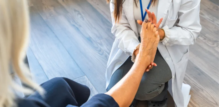 Physiotherapist providing foot drop physiotherapy treatment at home in Karachi