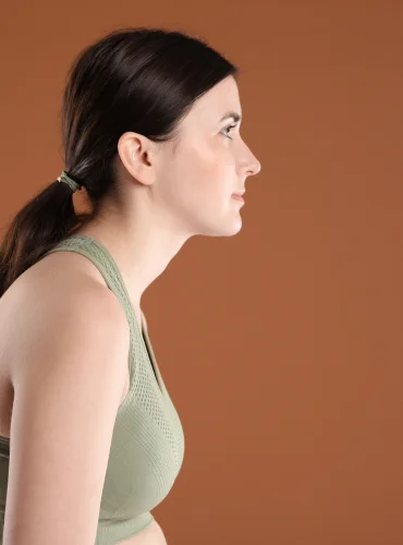 Physiotherapist providing forward head posture physiotherapy treatment at home in Karachi