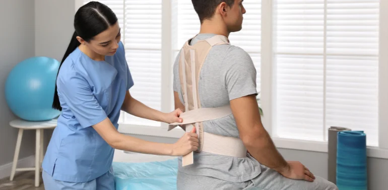 Physiotherapist providing muscular imbalance physiotherapy treatment at home in Karachi