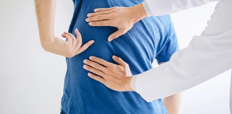 Physiotherapist providing myofascial pain syndrome physiotherapy treatment at home in Karachi