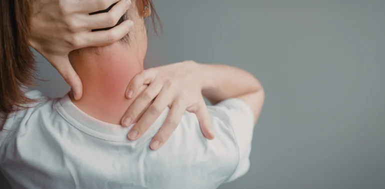 Physiotherapist providing neck pain physiotherapy treatment at home in Karachi