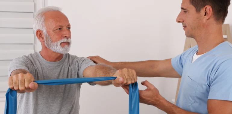 Post-Stroke Contracture Physiotherapy 3 Physiotherapist providing post-stroke contracture physiotherapy treatment at home in Karachi