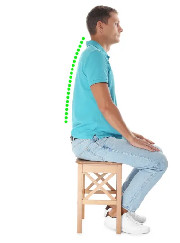 Physiotherapist providing posture correction physiotherapy treatment at home in Karachi